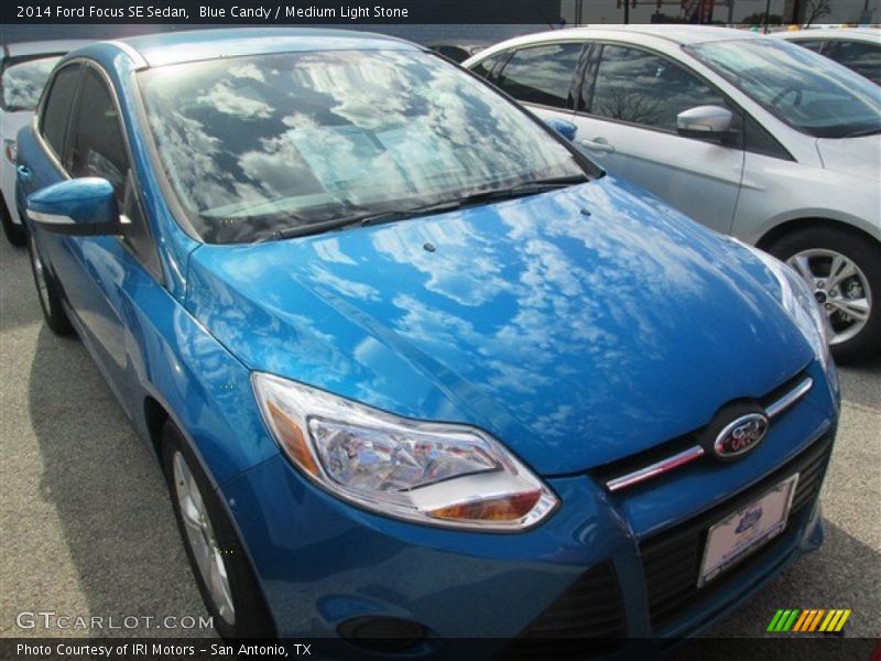 Blue Candy / Medium Light Stone 2014 Ford Focus SE Sedan