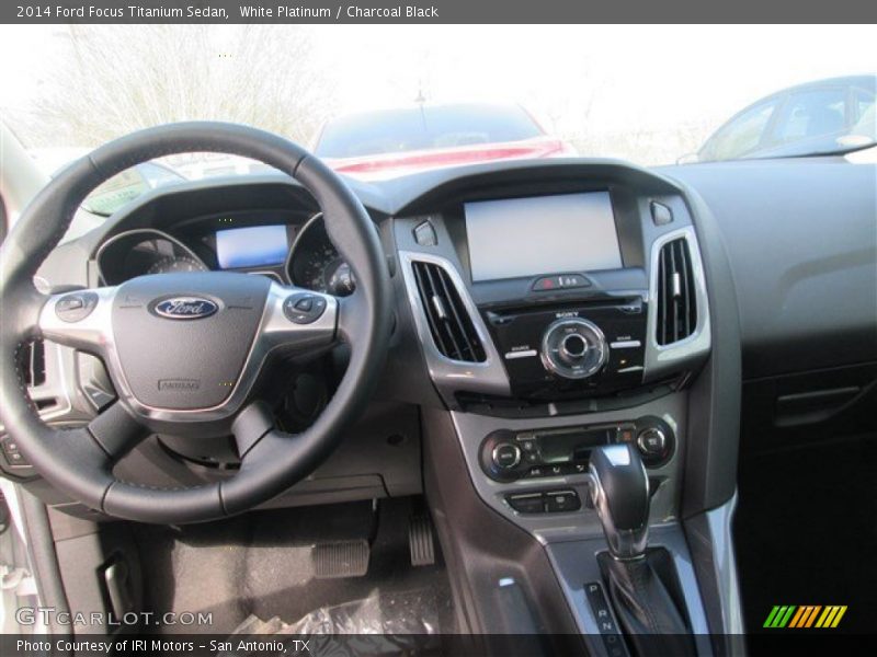 White Platinum / Charcoal Black 2014 Ford Focus Titanium Sedan