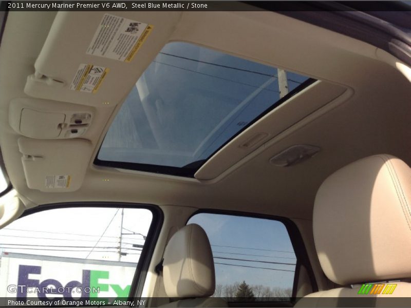 Steel Blue Metallic / Stone 2011 Mercury Mariner Premier V6 AWD