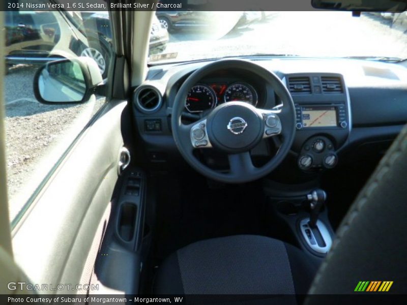 Brilliant Silver / Charcoal 2014 Nissan Versa 1.6 SL Sedan
