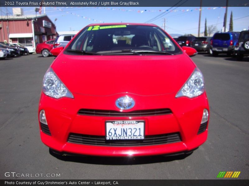 Absolutely Red / Light Blue Gray/Black 2012 Toyota Prius c Hybrid Three