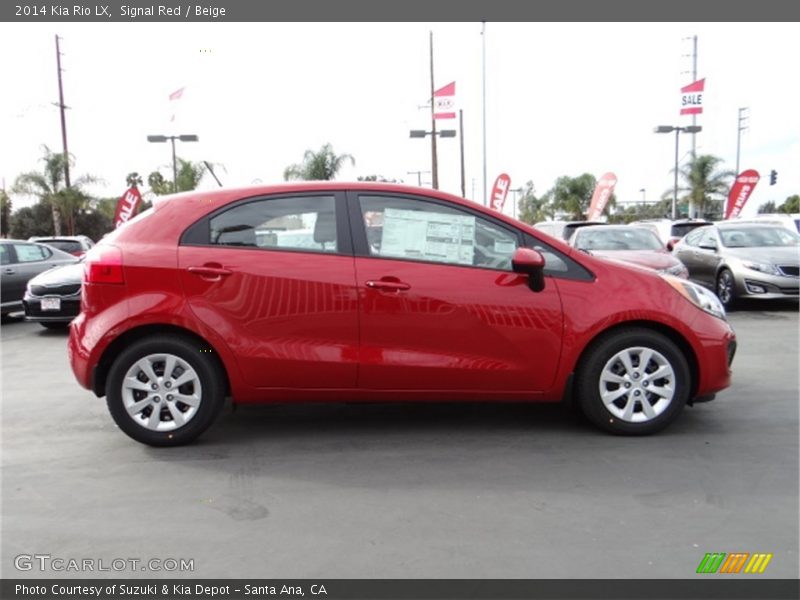  2014 Rio LX Signal Red