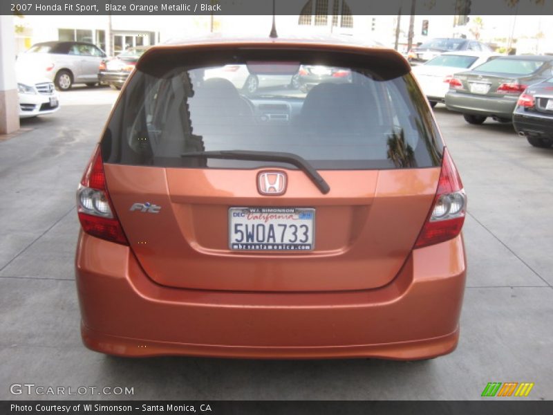 Blaze Orange Metallic / Black 2007 Honda Fit Sport