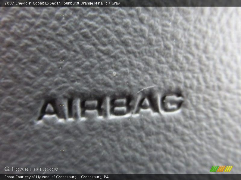 Sunburst Orange Metallic / Gray 2007 Chevrolet Cobalt LS Sedan