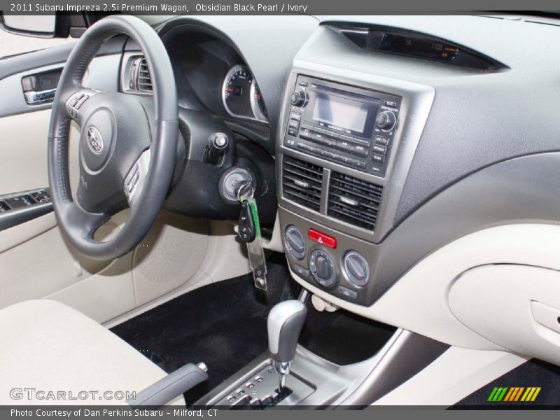Obsidian Black Pearl / Ivory 2011 Subaru Impreza 2.5i Premium Wagon