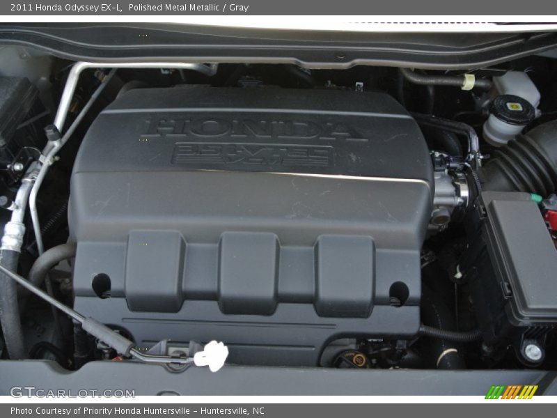 Polished Metal Metallic / Gray 2011 Honda Odyssey EX-L
