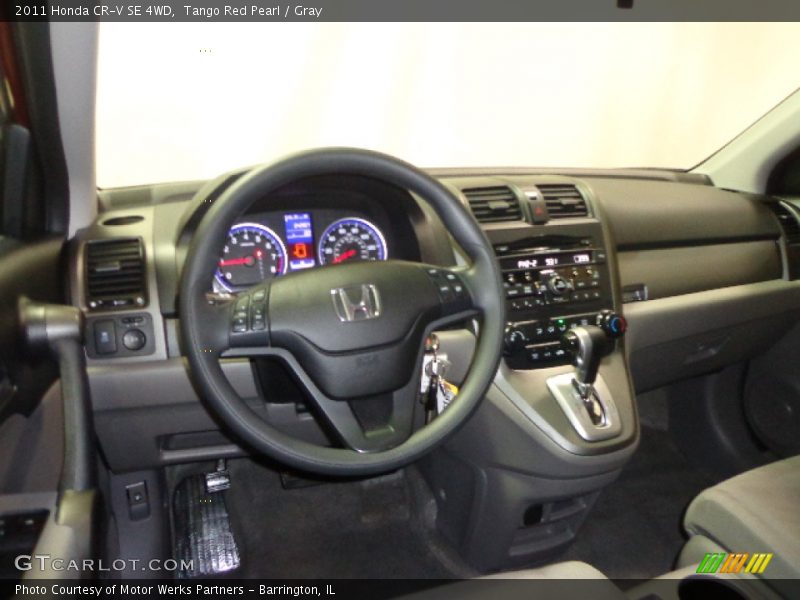 Tango Red Pearl / Gray 2011 Honda CR-V SE 4WD