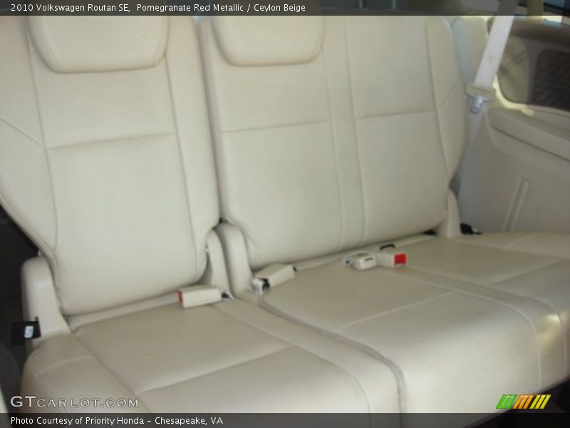 Pomegranate Red Metallic / Ceylon Beige 2010 Volkswagen Routan SE