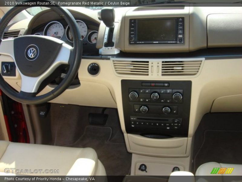 Pomegranate Red Metallic / Ceylon Beige 2010 Volkswagen Routan SE