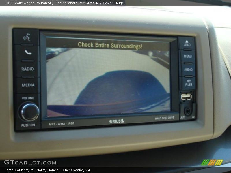 Pomegranate Red Metallic / Ceylon Beige 2010 Volkswagen Routan SE