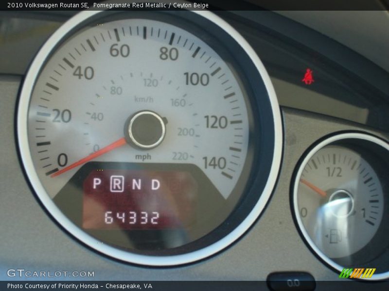 Pomegranate Red Metallic / Ceylon Beige 2010 Volkswagen Routan SE