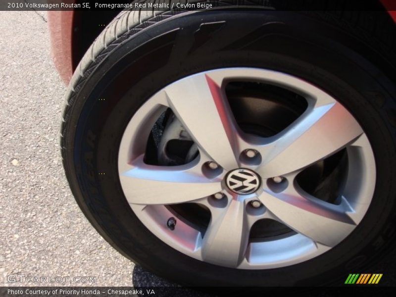 Pomegranate Red Metallic / Ceylon Beige 2010 Volkswagen Routan SE
