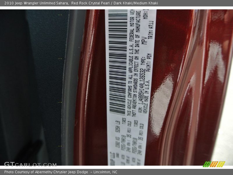 Red Rock Crystal Pearl / Dark Khaki/Medium Khaki 2010 Jeep Wrangler Unlimited Sahara