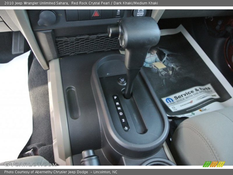 Red Rock Crystal Pearl / Dark Khaki/Medium Khaki 2010 Jeep Wrangler Unlimited Sahara