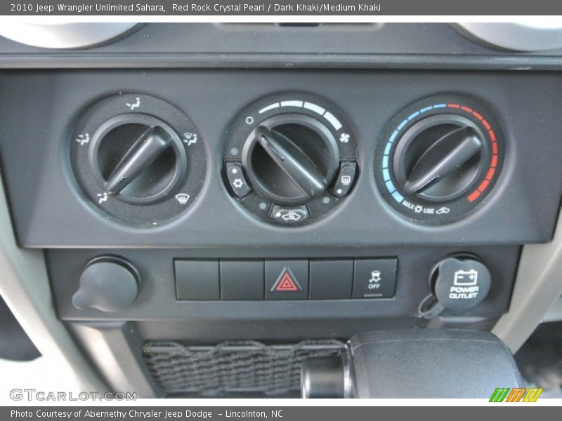 Red Rock Crystal Pearl / Dark Khaki/Medium Khaki 2010 Jeep Wrangler Unlimited Sahara