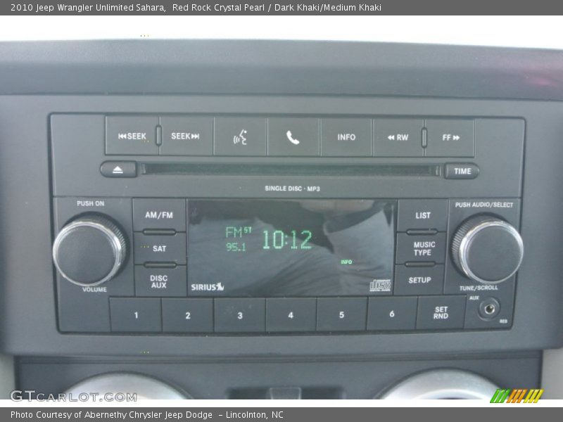 Red Rock Crystal Pearl / Dark Khaki/Medium Khaki 2010 Jeep Wrangler Unlimited Sahara