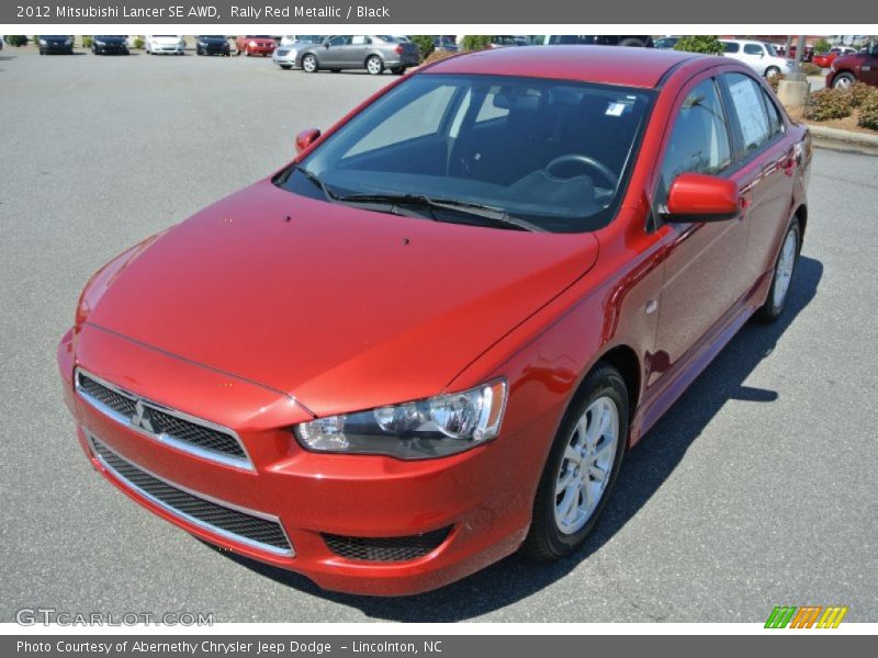 Rally Red Metallic / Black 2012 Mitsubishi Lancer SE AWD
