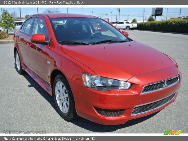Rally Red Metallic / Black 2012 Mitsubishi Lancer SE AWD