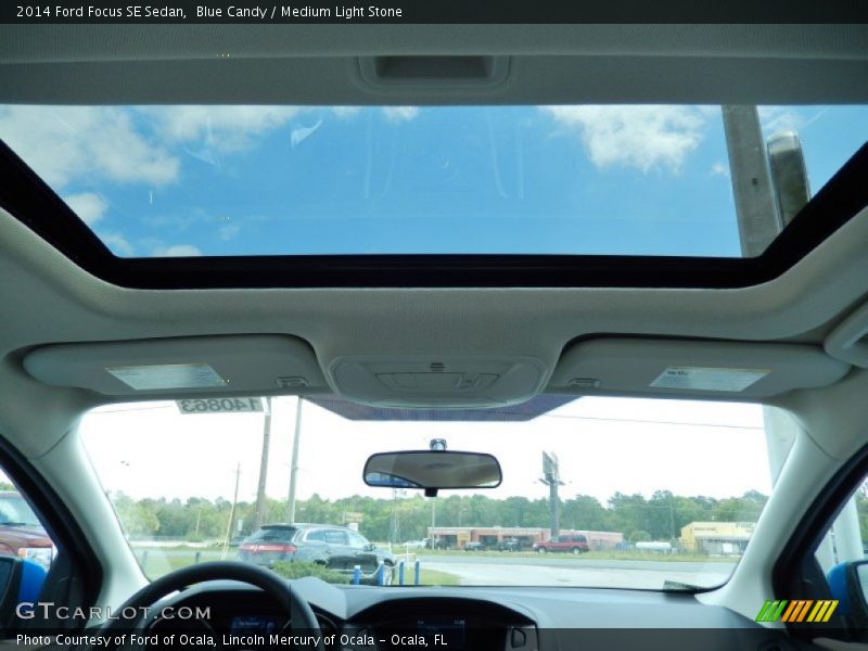 Blue Candy / Medium Light Stone 2014 Ford Focus SE Sedan