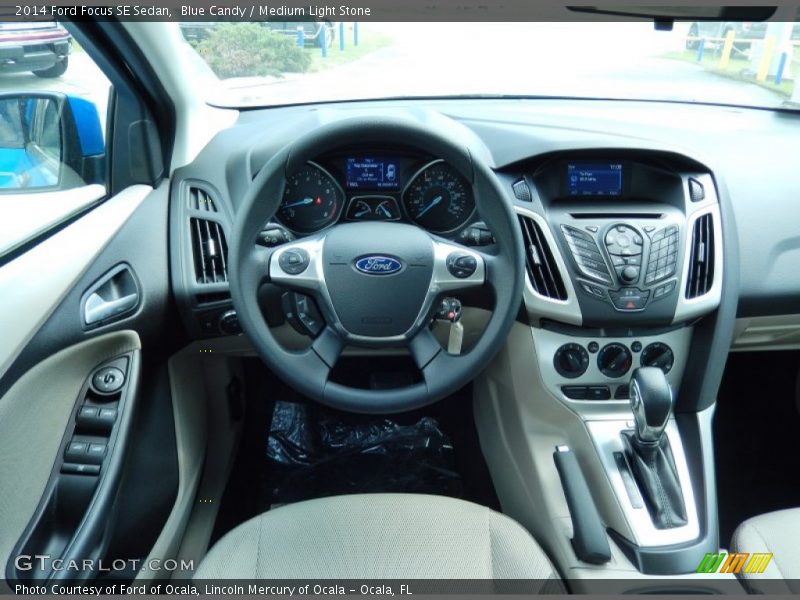 Blue Candy / Medium Light Stone 2014 Ford Focus SE Sedan
