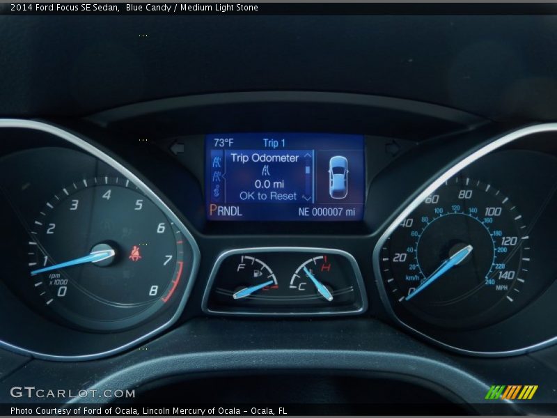 Blue Candy / Medium Light Stone 2014 Ford Focus SE Sedan