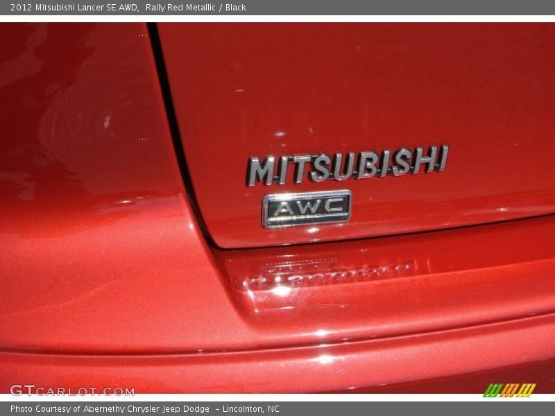 Rally Red Metallic / Black 2012 Mitsubishi Lancer SE AWD