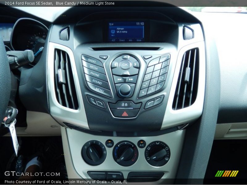 Blue Candy / Medium Light Stone 2014 Ford Focus SE Sedan