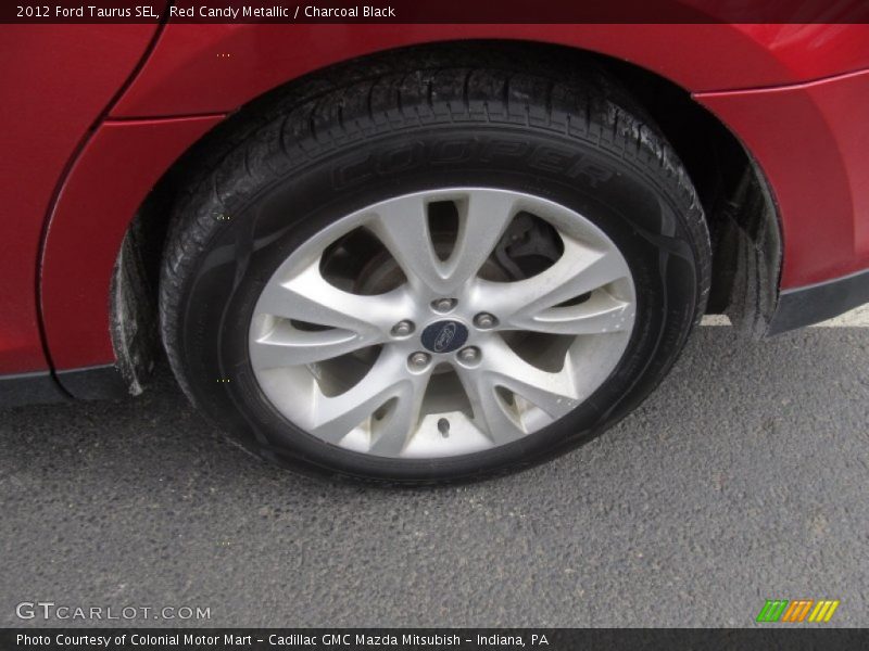 Red Candy Metallic / Charcoal Black 2012 Ford Taurus SEL
