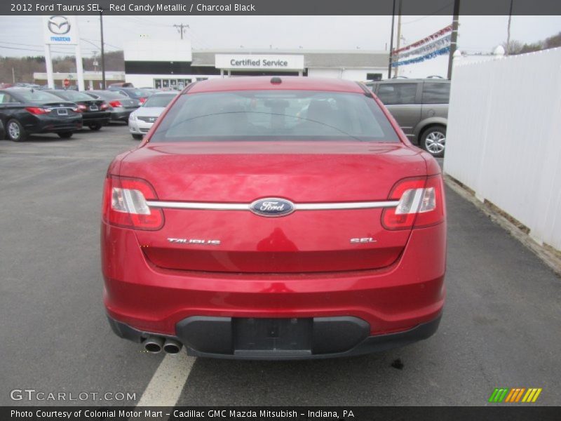 Red Candy Metallic / Charcoal Black 2012 Ford Taurus SEL