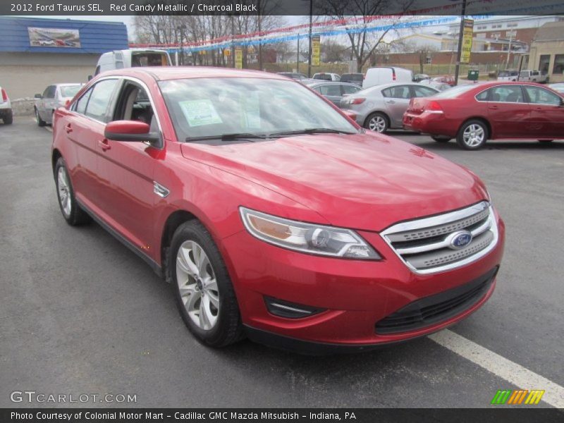 Red Candy Metallic / Charcoal Black 2012 Ford Taurus SEL