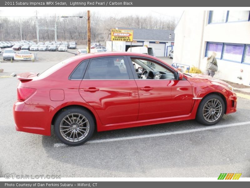 Lightning Red Pearl / Carbon Black 2011 Subaru Impreza WRX Sedan