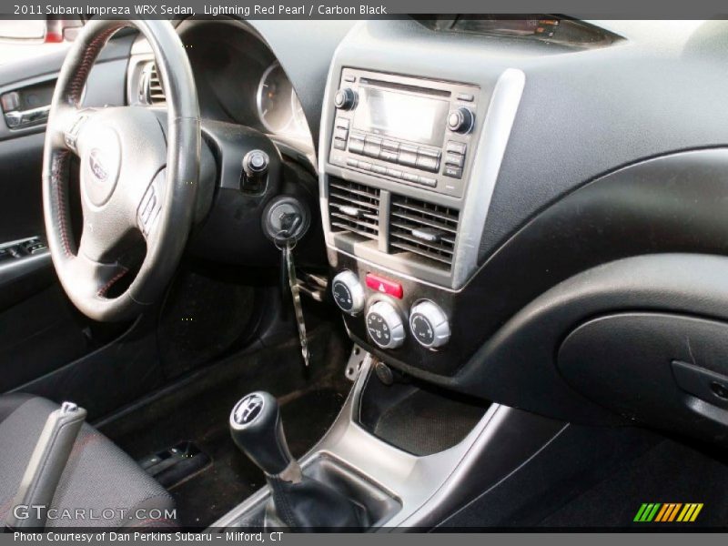 Lightning Red Pearl / Carbon Black 2011 Subaru Impreza WRX Sedan