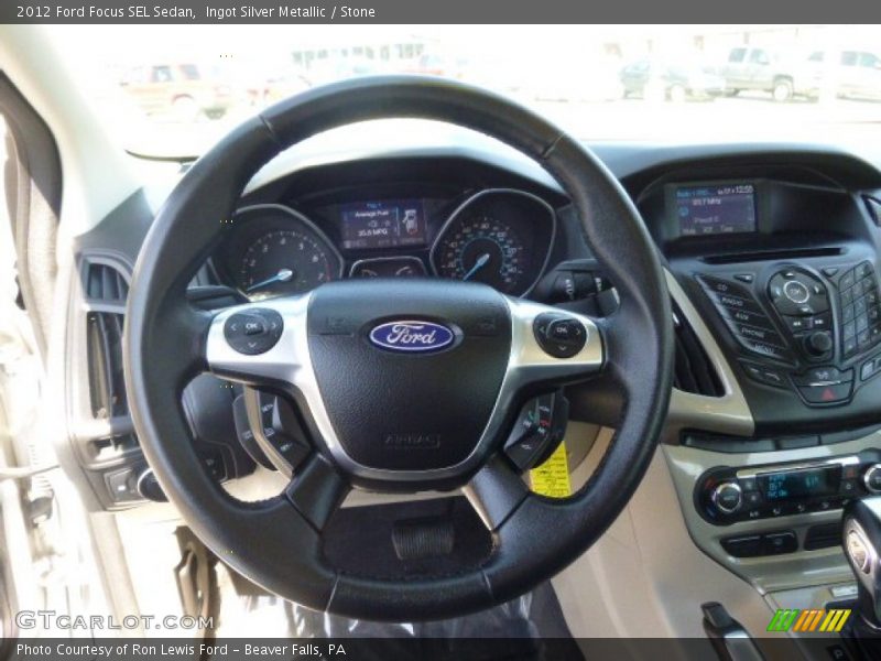 Ingot Silver Metallic / Stone 2012 Ford Focus SEL Sedan