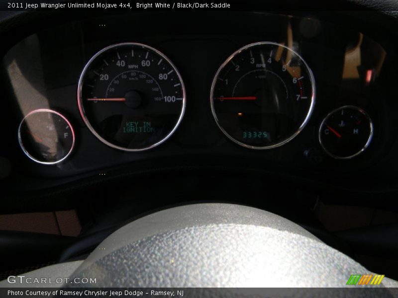 Bright White / Black/Dark Saddle 2011 Jeep Wrangler Unlimited Mojave 4x4