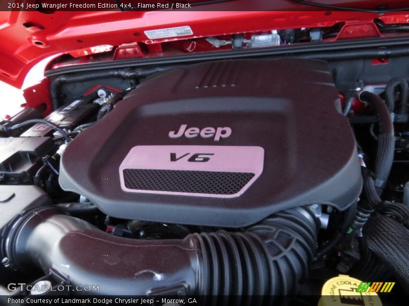Flame Red / Black 2014 Jeep Wrangler Freedom Edition 4x4