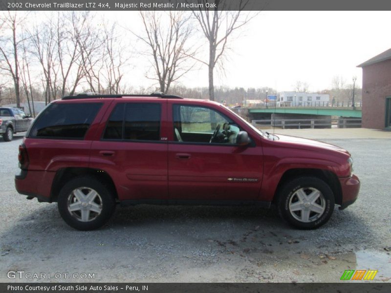 Majestic Red Metallic / Medium Oak 2002 Chevrolet TrailBlazer LTZ 4x4
