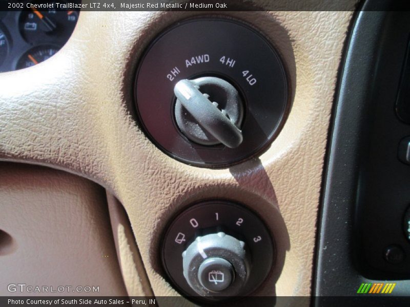Majestic Red Metallic / Medium Oak 2002 Chevrolet TrailBlazer LTZ 4x4