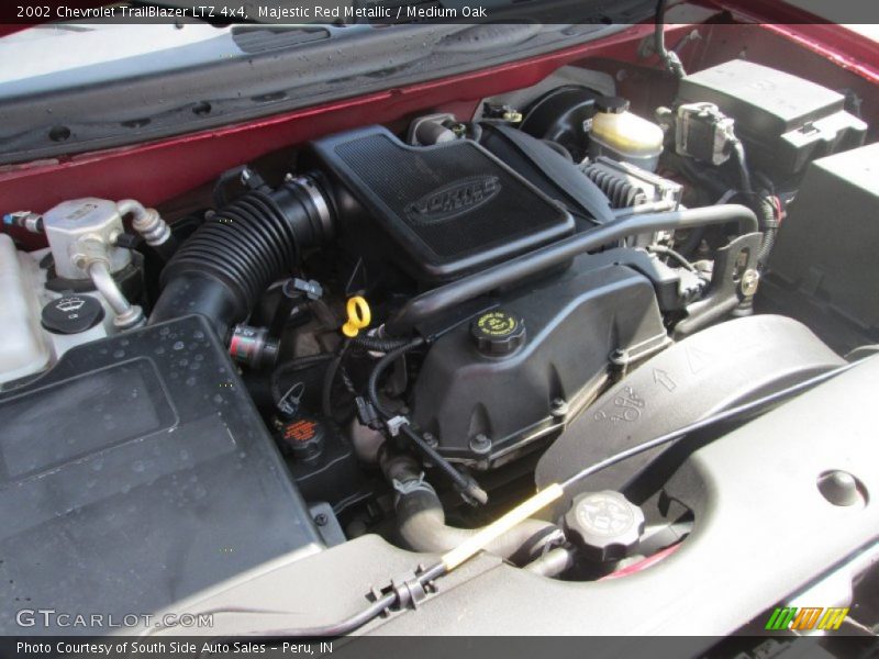 Majestic Red Metallic / Medium Oak 2002 Chevrolet TrailBlazer LTZ 4x4
