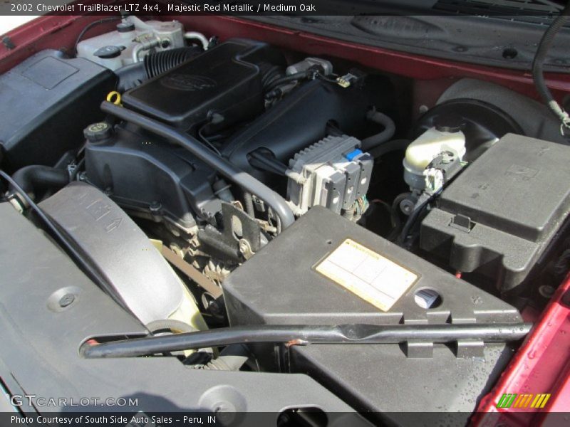Majestic Red Metallic / Medium Oak 2002 Chevrolet TrailBlazer LTZ 4x4