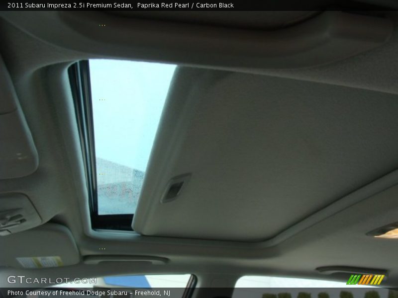 Paprika Red Pearl / Carbon Black 2011 Subaru Impreza 2.5i Premium Sedan