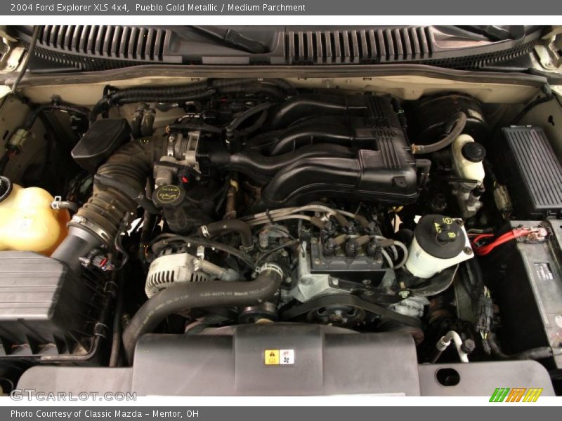 Pueblo Gold Metallic / Medium Parchment 2004 Ford Explorer XLS 4x4