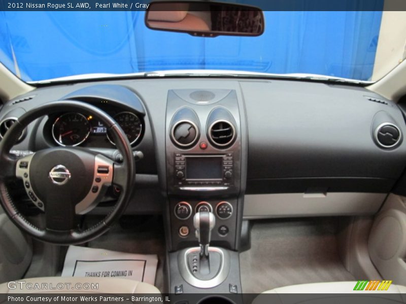 Pearl White / Gray 2012 Nissan Rogue SL AWD
