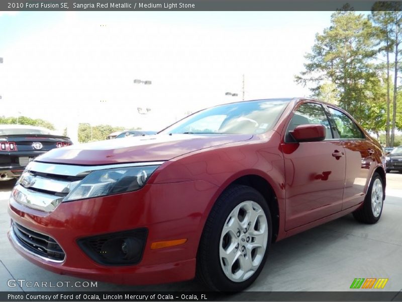 Sangria Red Metallic / Medium Light Stone 2010 Ford Fusion SE