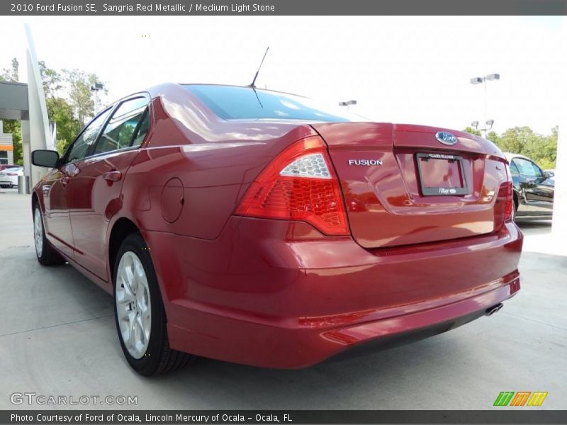 Sangria Red Metallic / Medium Light Stone 2010 Ford Fusion SE