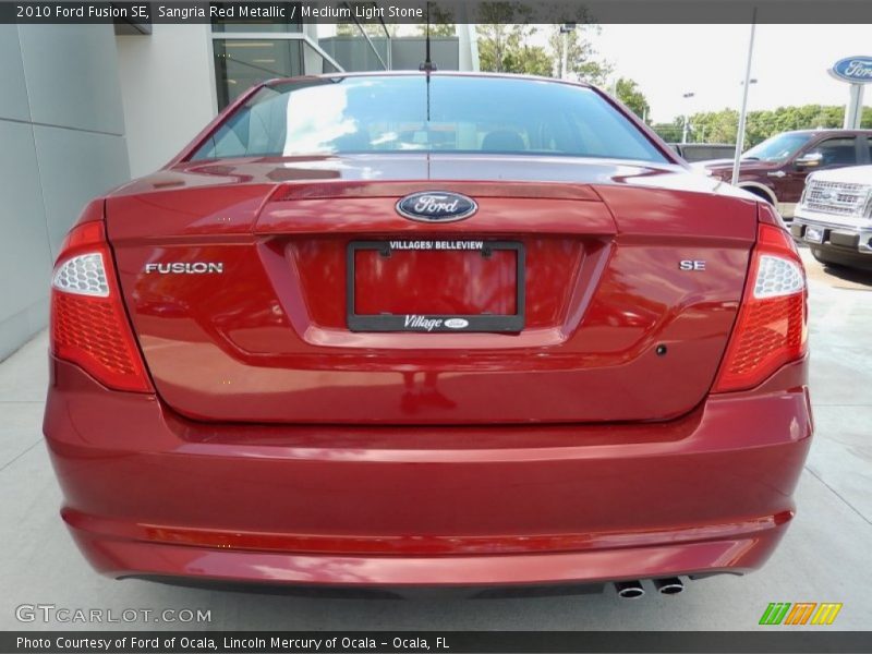 Sangria Red Metallic / Medium Light Stone 2010 Ford Fusion SE