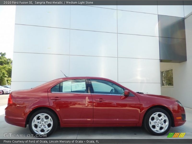 Sangria Red Metallic / Medium Light Stone 2010 Ford Fusion SE