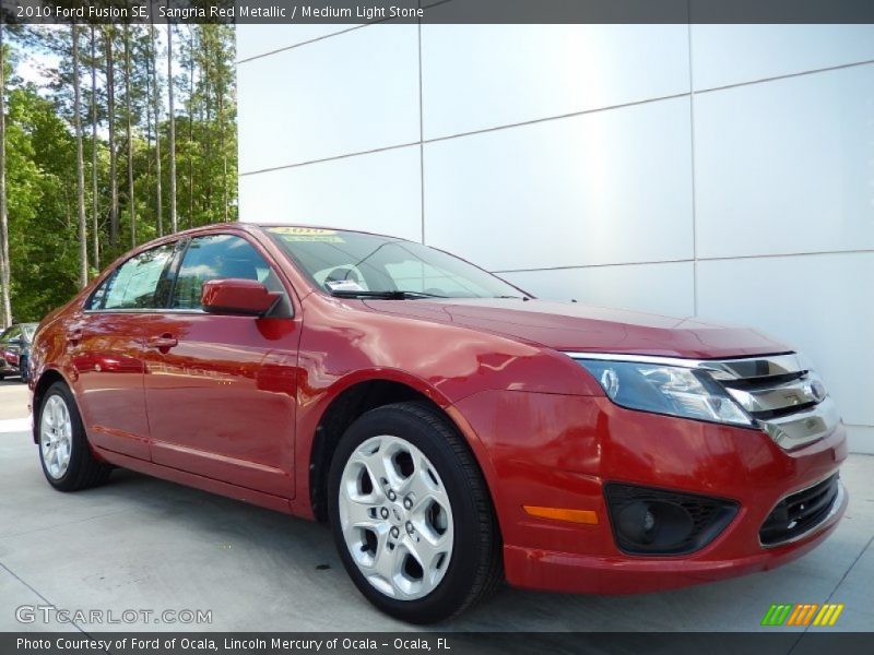 Sangria Red Metallic / Medium Light Stone 2010 Ford Fusion SE