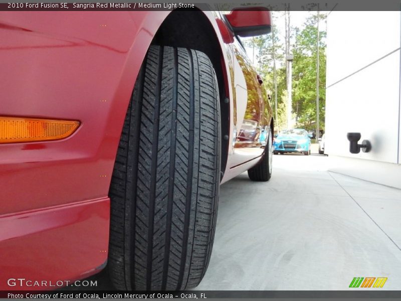 Sangria Red Metallic / Medium Light Stone 2010 Ford Fusion SE
