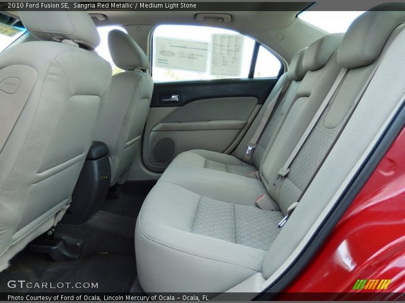 Sangria Red Metallic / Medium Light Stone 2010 Ford Fusion SE