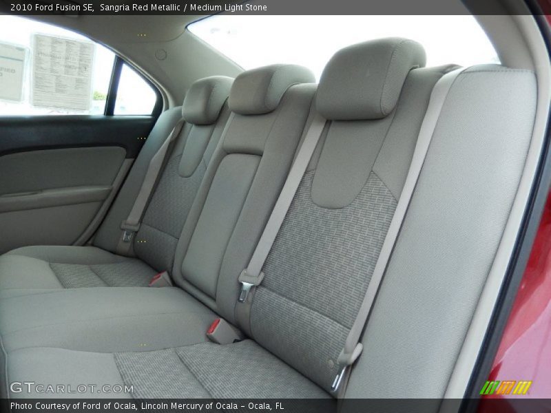 Sangria Red Metallic / Medium Light Stone 2010 Ford Fusion SE